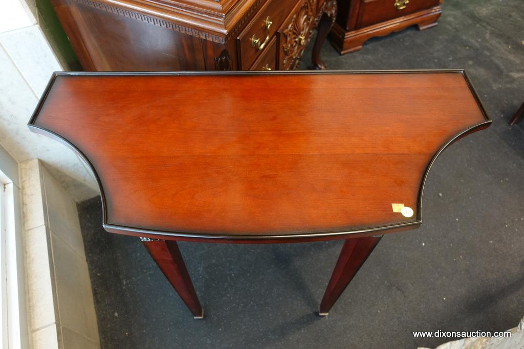 (WIN) CONSOLE TABLE; CONCAVE CORNERS AND BRASS RECTANGULAR FLORAL PLAQUES AND CAPPED FEET HIGHLIGHT