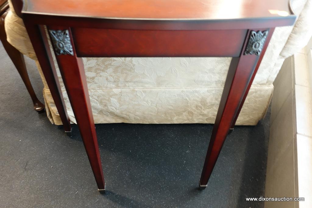 (WIN) CONSOLE TABLE; CONCAVE CORNERS AND BRASS RECTANGULAR FLORAL PLAQUES AND CAPPED FEET HIGHLIGHT