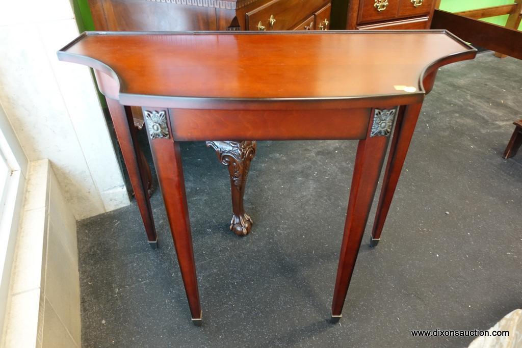 (WIN) CONSOLE TABLE; CONCAVE CORNERS AND BRASS RECTANGULAR FLORAL PLAQUES AND CAPPED FEET HIGHLIGHT