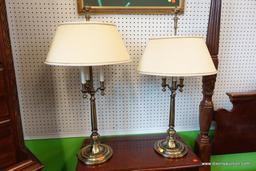 (R1) VINTAGE TABLE LAMPS; EACH HAS 3 CANDLESTICK-STYLE POSTS, BRASS FINIAL AND BASE, A YELLOW-BEIGE