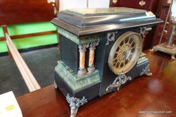 (R1) ANTIQUE SETH THOMAS ADAMANTINE MANTEL CLOCK; 2 COLUMNS ON EACH SIDE OF THE GLASS FACE WHICH