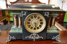 (R1) ANTIQUE SETH THOMAS ADAMANTINE MANTEL CLOCK; 2 COLUMNS ON EACH SIDE OF THE GLASS FACE WHICH