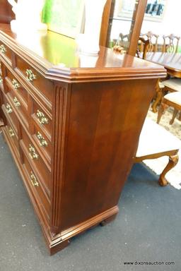 (R1) CHERRY DRESSER BY BASSETT; 9 TOTAL DRAWERS (2/3/2/2) WITH PANELED FRONTS AND BRASS BATWING PULL