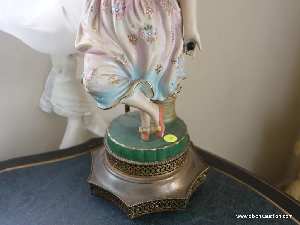 (BED) PORCELAIN VICTORIAN STATUE LAMP WITH LAMPSHADE; YOUNG MAIDEN IN PASTEL SHADES STANDING ON A