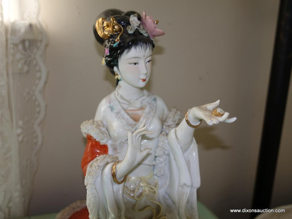 (BED) PORCELAIN GEISHA GIRL STATUE; VERY FORMALLY DRESSED WOMAN IN A KNEELING POSE. REDS AND PASTELS