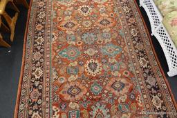 RED HAND-KNOTTED AREA RUG