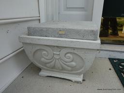 (FRONT) PAIR OF CEMENT PLANTERS