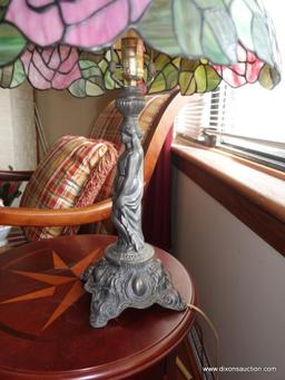 (LR) ONE OF A PAIR OF FIGURAL METAL BASE TIFFANY STYLE LAMPS (MATCHES 67 )-26"H
