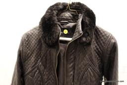 (CLO1) LEATHER JACKET; QUILTED BLACK LEATHER JACKET WITH DETACHABLE PLUSH FAUX FUR COLLAR. MADE BY