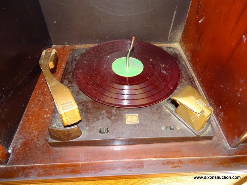 (LR) VINTAGE MAHOGANY RCA STEREO IN CABINET- AM/FM AND PHONOGRAPH- 30"W X 16"L X 34"H- ( DELIVERY