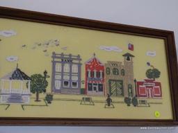 (ENTRANCE HALL) FRAMED CREWEL STITCH OF STREET SCENE IN OAK FRAME-36"W X 13"H