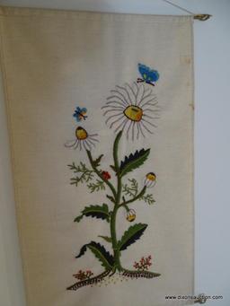 (UHAL) 2 FLORAL WALL HANGING TAPESTRIES: 1 OF A DAISY AND 1 OF A POPPY