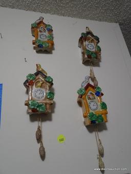 (UHAL) LOT OF 4 CUCKOO CLOCK THEMED WALL POCKETS WITH A DIFFERENT COLORED BIRD ON EACH WALL POCKET