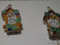 (UHAL) LOT OF 4 CUCKOO CLOCK THEMED WALL POCKETS WITH A DIFFERENT COLORED BIRD ON EACH WALL POCKET