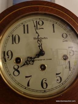 (UHAL) BALDWIN DOME TOP MANTLE CLOCK WITH WESTMINSTER CHIME AND METAL FACE. HAS BRASS HANDLES ON