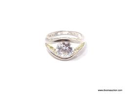 Stunning 2 carat CZ and .925 silver engagement ring. This gorgeous ring is a size 8 with filigree