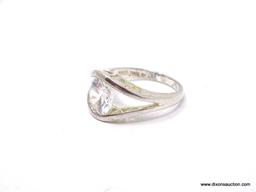 Stunning 2 carat CZ and .925 silver engagement ring. This gorgeous ring is a size 8 with filigree