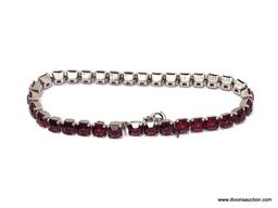 Vintage sterling and wine crystal 7" bracelet of outstanding quality. Once you pick this beauty up