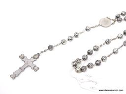 VINTAGE SILVER COLORED ROSARY; WITH ROUND BEADS ON A 25 IN STRAND, ROUND PORTRAIT MEDAL, AND