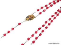 VINTAGE ROSARY WITH RED PLASTIC BEADS; ON A SILVER COLORED STRAND MEASURING 29 IN LONG, WITH A