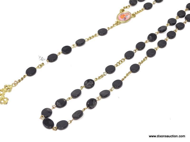 VINTAGE ROSARY WITH BLACK BEADS; 5 SETS OF 10 FLAT BLACK OVAL-SHAPED BEADS, ON A GOLD COLORED STRAND