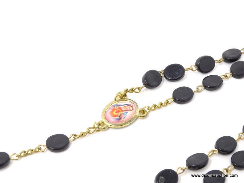 VINTAGE ROSARY WITH BLACK BEADS; 5 SETS OF 10 FLAT BLACK OVAL-SHAPED BEADS, ON A GOLD COLORED STRAND