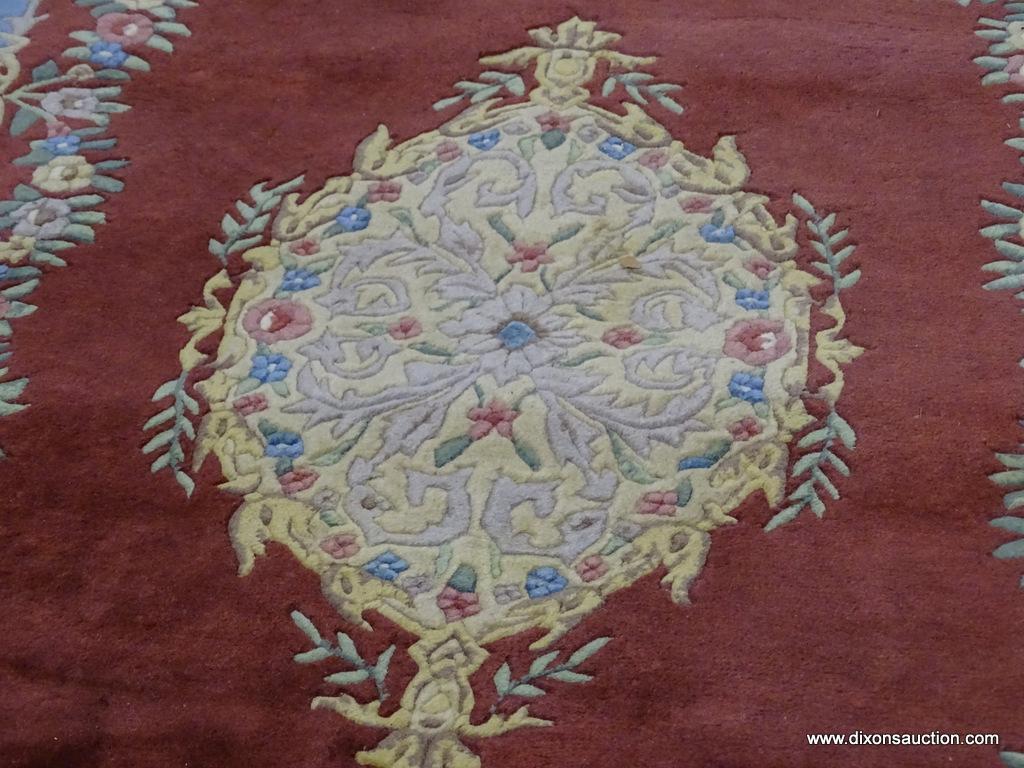 KALEEN BY CAPEL MACHINE MADE RUG. MEASURES 7 FT X 9 FT. IN THE EDEN STYLE. IN REDS, BLUES, IVORIES,