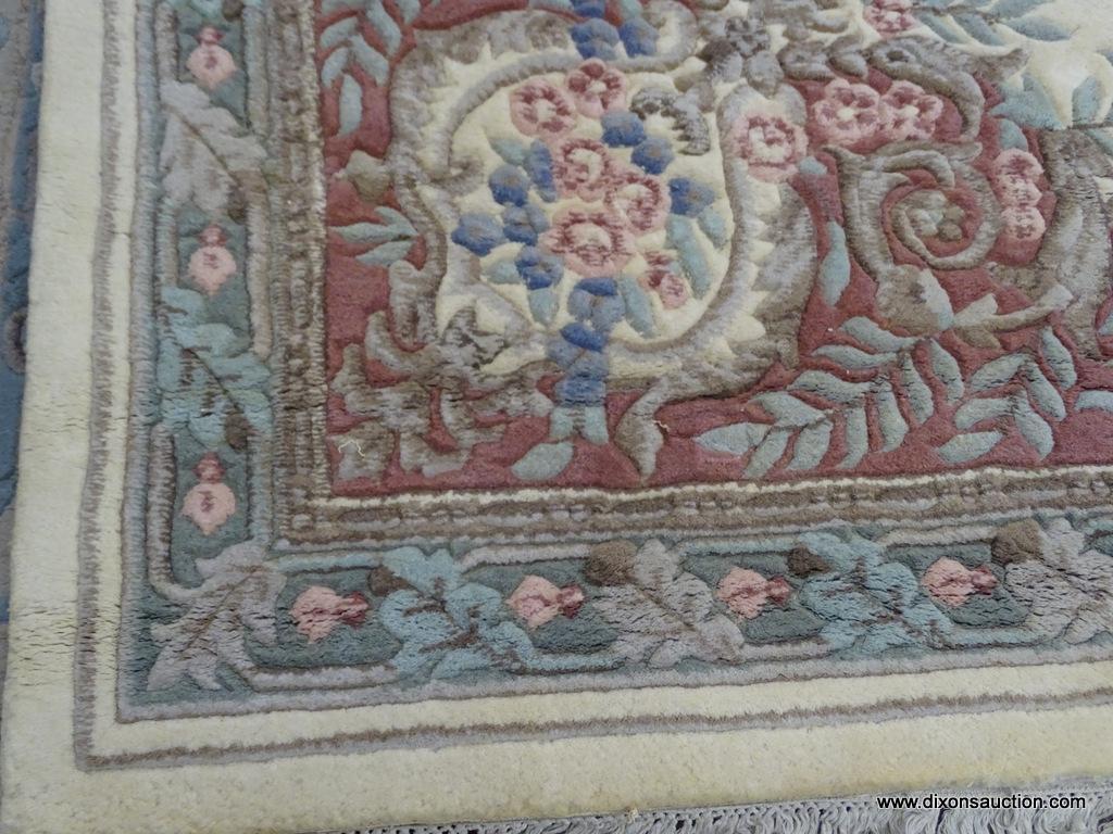 HAND WOVEN AUBUSSON STYLE RUG MADE IN INDIA. IS IN GOOD CONDITION. IN IVORY, PINKS, BLUES, AND