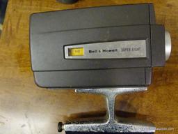 BELL AND HOWELL SUPER EIGHT CAMERA AND CASE; CIRCA 1960'S HANDHELD MODEL, COMES WITH FLIP TOP CASE