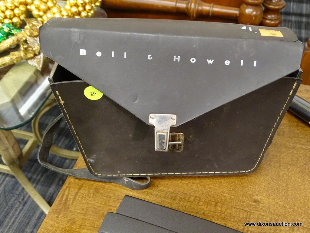 BELL AND HOWELL SUPER EIGHT CAMERA AND CASE; CIRCA 1960'S HANDHELD MODEL, COMES WITH FLIP TOP CASE