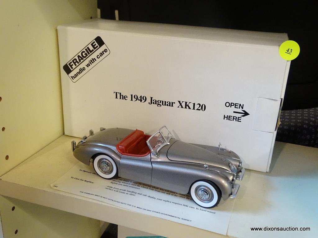 JAGUAR XK120; THE DANBURY MINT 1949 JAGUAR XK120 1:24 SCALE MODEL CAR WITH THE ORIGINAL BOX.