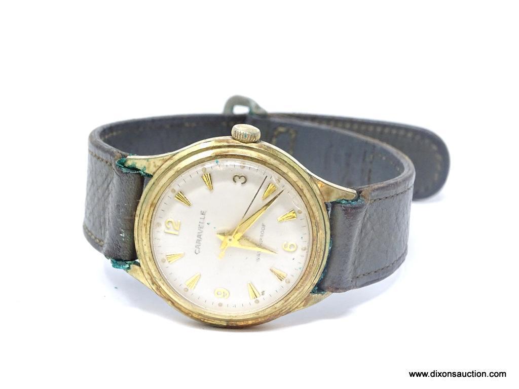 VINTAGE CARAVELLE WATERPROOF WRIST WATCH WITH LEATHER BAND.