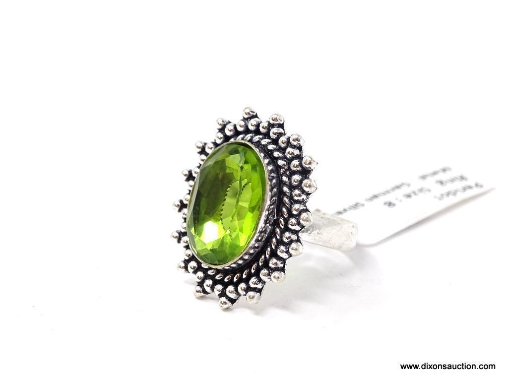 GERMAN SILVER & PERIDOT GEMSTONE RING. APPROX. RING SIZE 8.