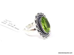 GERMAN SILVER & PERIDOT GEMSTONE RING. APPROX. RING SIZE 8.