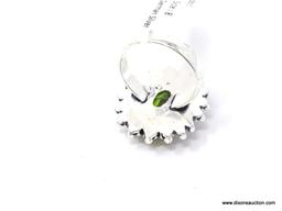 GERMAN SILVER & PERIDOT GEMSTONE RING. APPROX. RING SIZE 8.