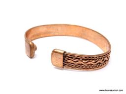 VINTAGE COPPER SOUTHWESTERN DESIGN MAGNETIC THERAPY CUFF BRACELET. APPROX. 1/2" WIDE. MEASURES ABOUT