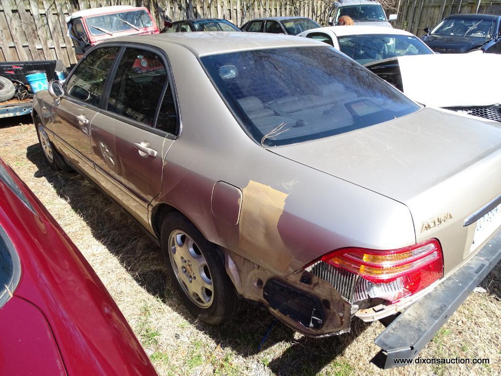 2000 SILVER ACURA 3.5 RL; VIN JH4KA9667YC007977. THIS VEHICLE WAS ABANDONED AT A GAS STATION. NO