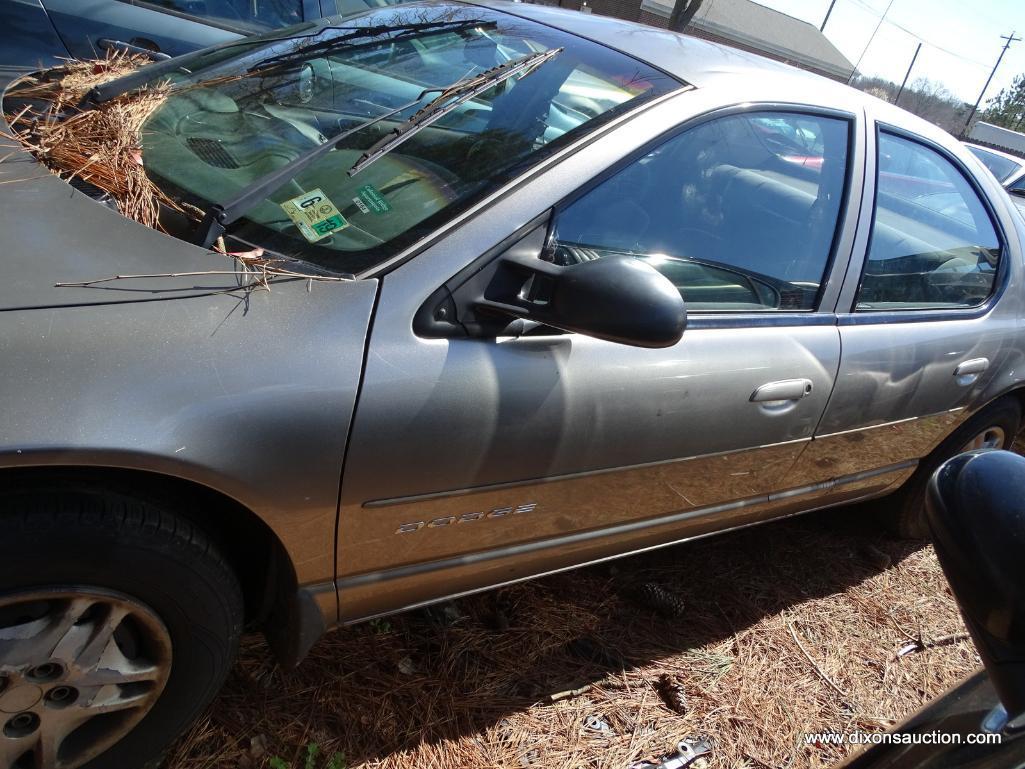 1999 GREY DODGE STRATUS; VIN 1B3EJ46X6XN505943. THIS VEHICLE WAS ABANDONED AT A GAS STATION WITH A