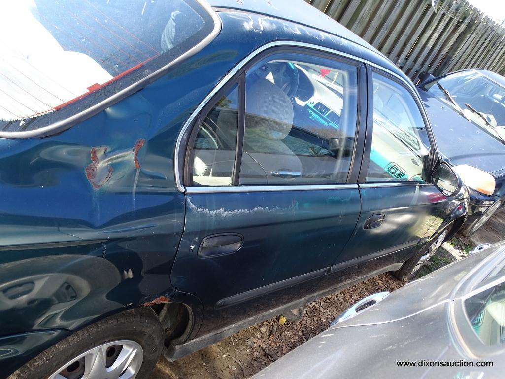 1997 TEAL HONDA CIVIC LX; VIN 2HGEJ667XVH560641. 214,000 MILES. THIS CAR WAS ABANDONED ON BOULEVARD