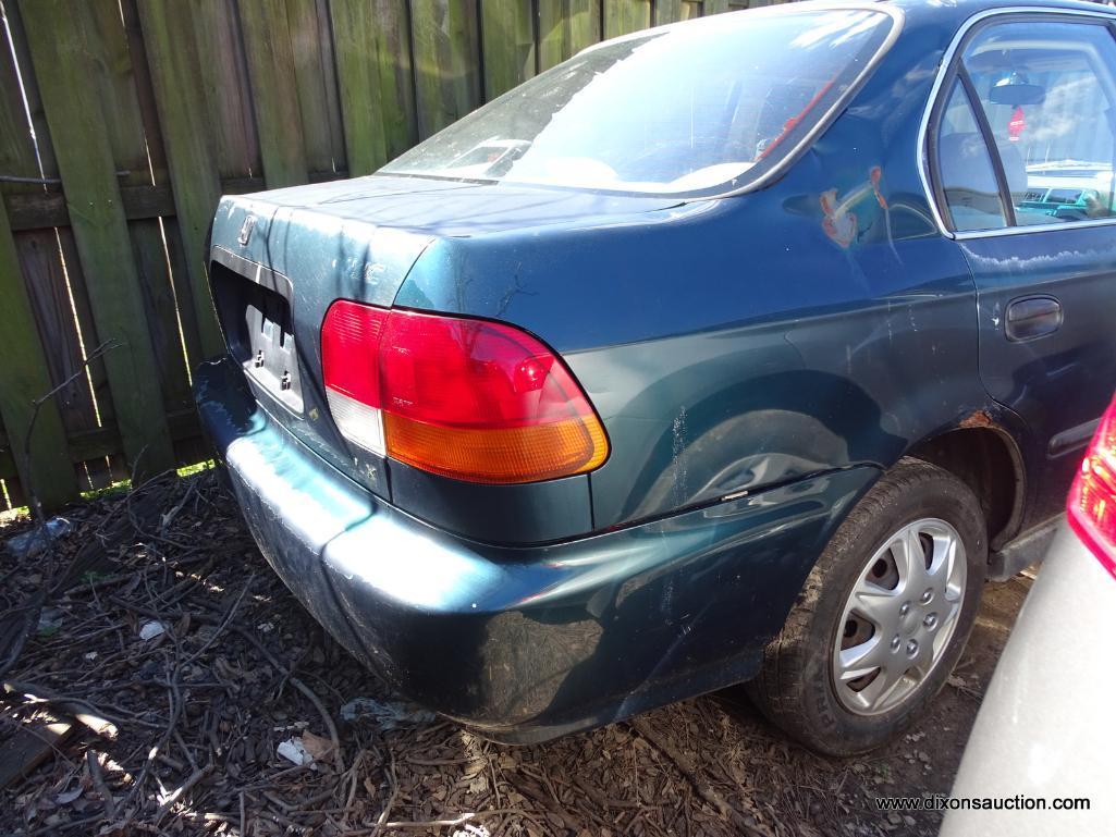 1997 TEAL HONDA CIVIC LX; VIN 2HGEJ667XVH560641. 214,000 MILES. THIS CAR WAS ABANDONED ON BOULEVARD