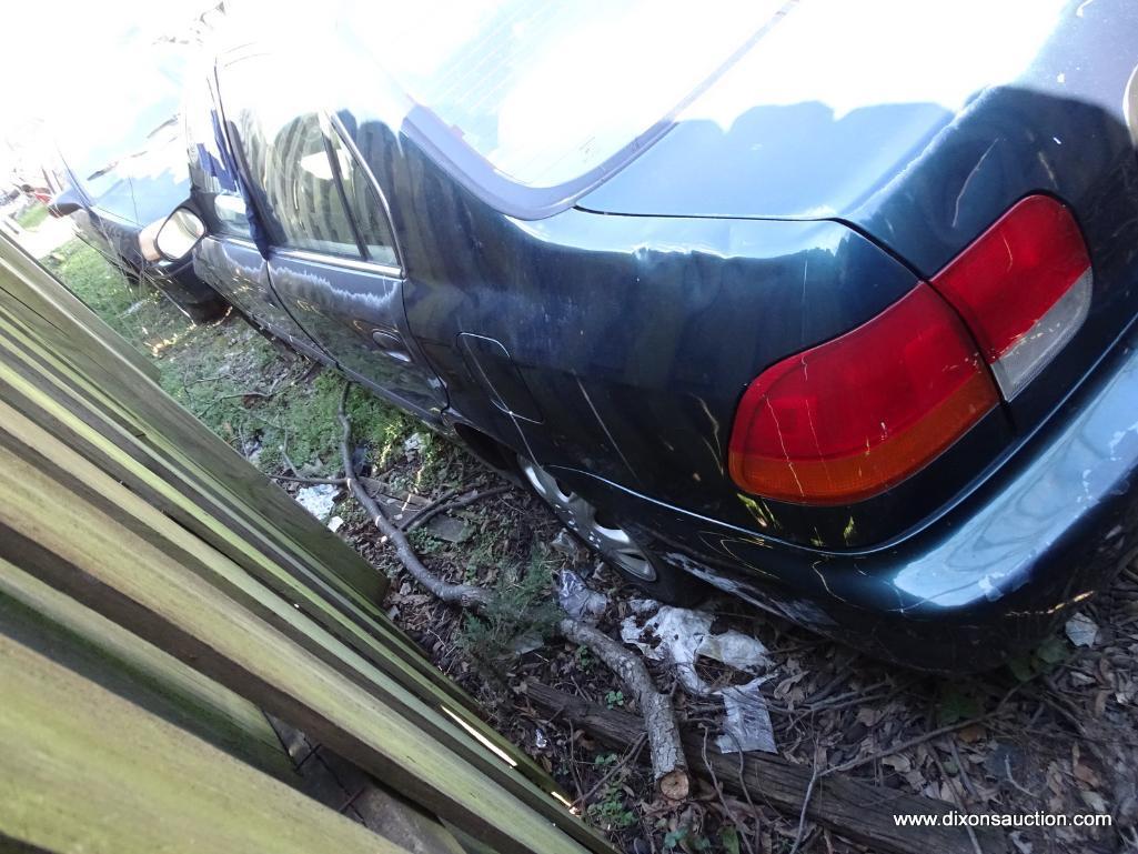 1997 TEAL HONDA CIVIC LX; VIN 2HGEJ667XVH560641. 214,000 MILES. THIS CAR WAS ABANDONED ON BOULEVARD