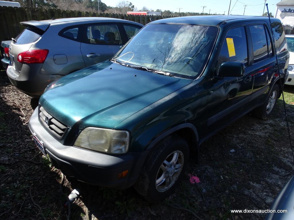 GREEN HONDA CR-V; VIN JHLRD1861009196. 240,811 MILES. THIS CAR WAS ABANDONED AT A HOME DEPOT. NO