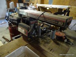 (GAR) RADIAL ARM SAW; CRAFTSMAN RADIAL ARM SAW ON STAND-40 IN X 34 IN X 60 IN.