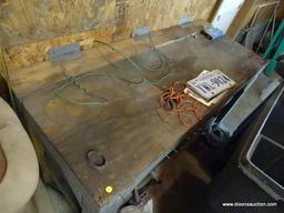 (GAR) WORK BENCH; HOMEMADE WORK BENCH, MEASURES 61 IN X 26 IN X 33 IN, INCLUDES ANY CONTENTS