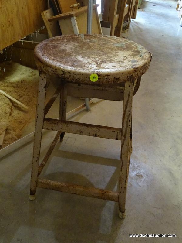 (GAR) STOOL; UNUSUAL VINTAGE METAL STOOL WITH FOLD DOWN BACK SUPPORT, MEASURES 21 IN H