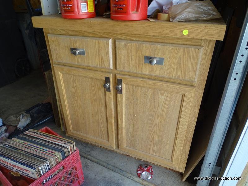 (GAR) CABINET; OAK CABINET WITH FORMICA TOP, GREAT FOR A SHOP, MEASURES 36 IN X 22 IN X 36 IN