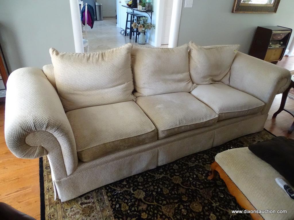 (LR) CLASSICS BY SWAIM 3-CUSHION PILLOW BACK SOFA; LOVELY BEIGE UPHOLSTERY WITH TAN ROPED TRIM.