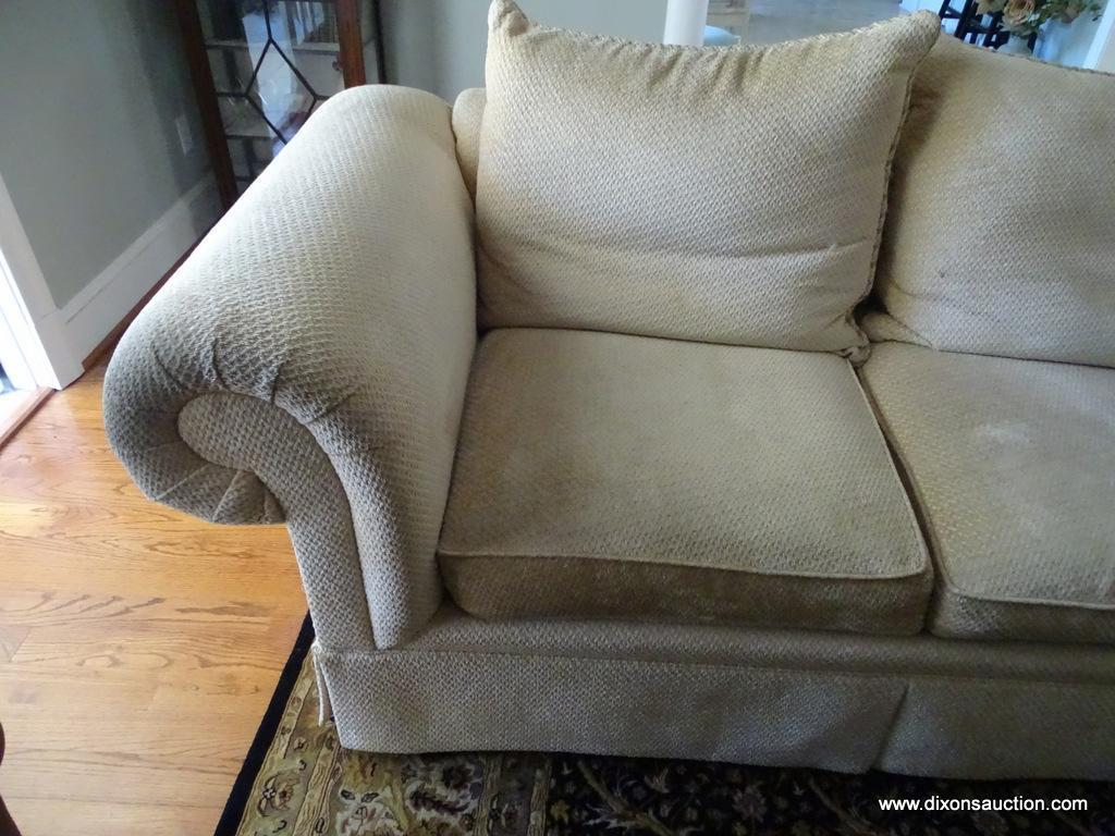 (LR) CLASSICS BY SWAIM 3-CUSHION PILLOW BACK SOFA; LOVELY BEIGE UPHOLSTERY WITH TAN ROPED TRIM.