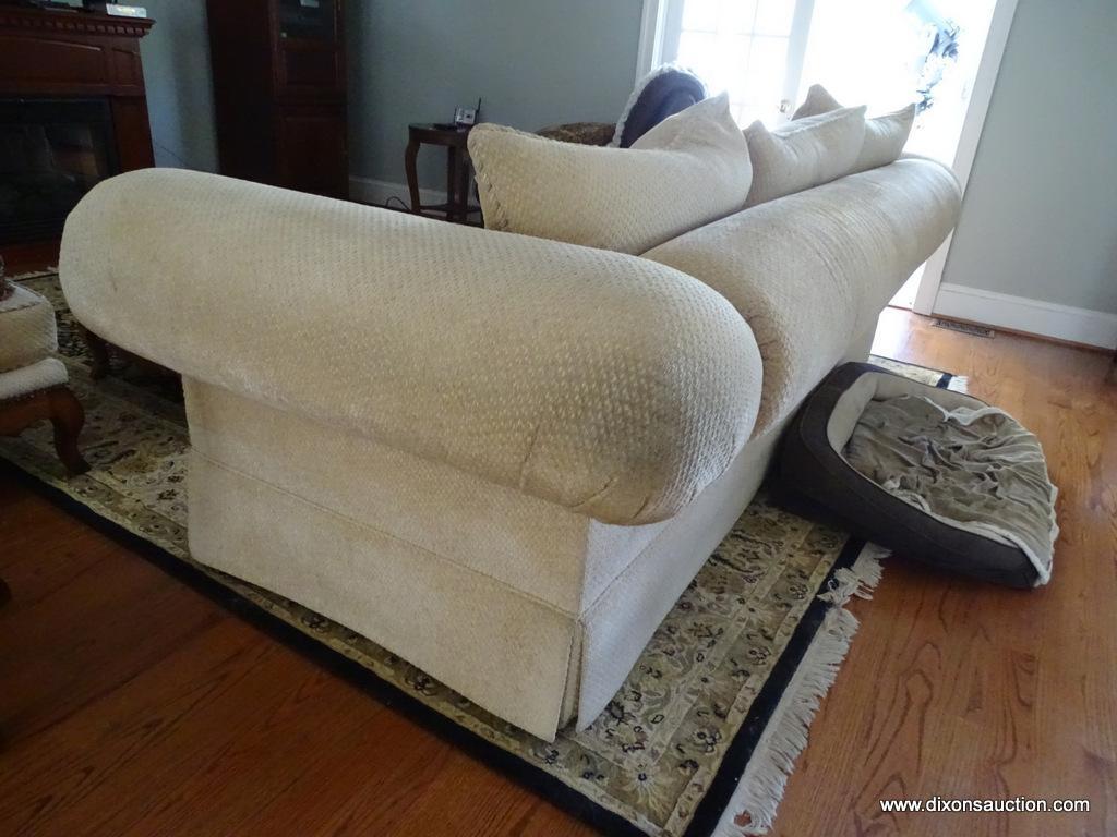 (LR) CLASSICS BY SWAIM 3-CUSHION PILLOW BACK SOFA; LOVELY BEIGE UPHOLSTERY WITH TAN ROPED TRIM.