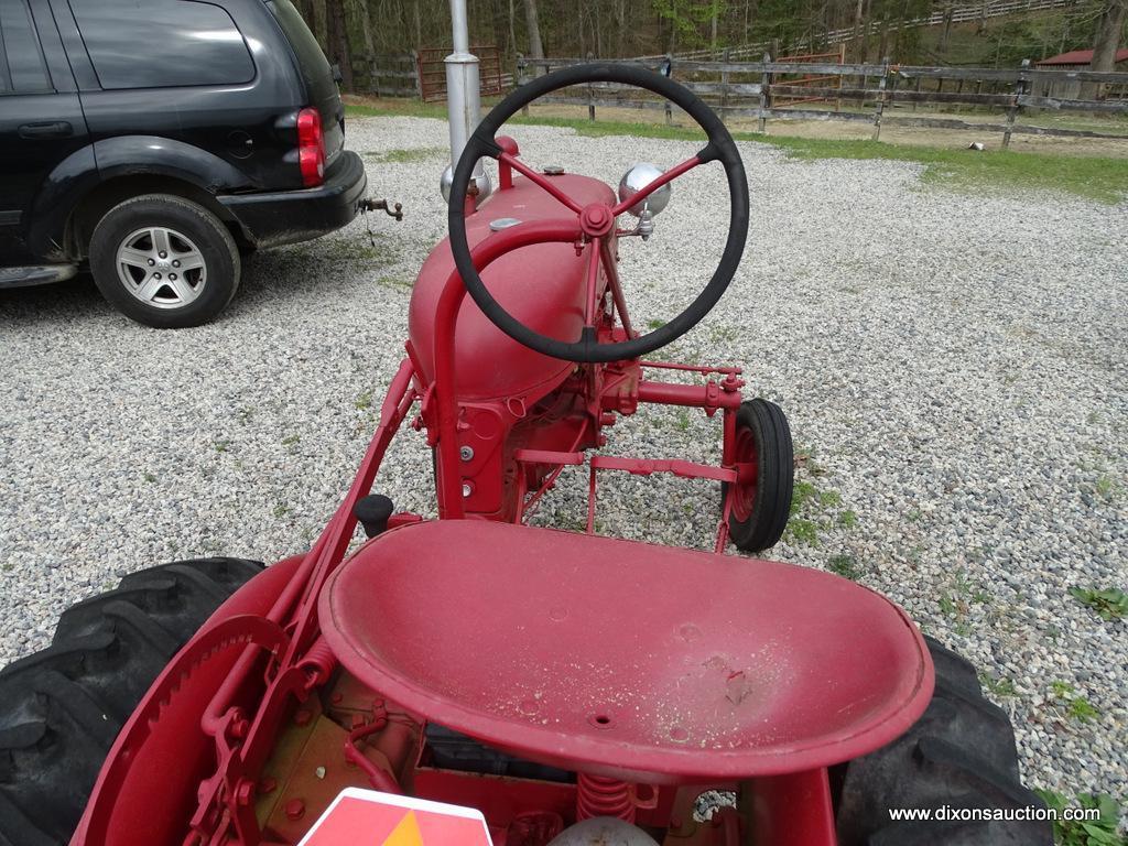 (OUT) 1942 MCCORMICK FARMALL CUB; THIS RED FULLY RESTORED TRACTOR. IT WAS FULLY RESTORED BY THE